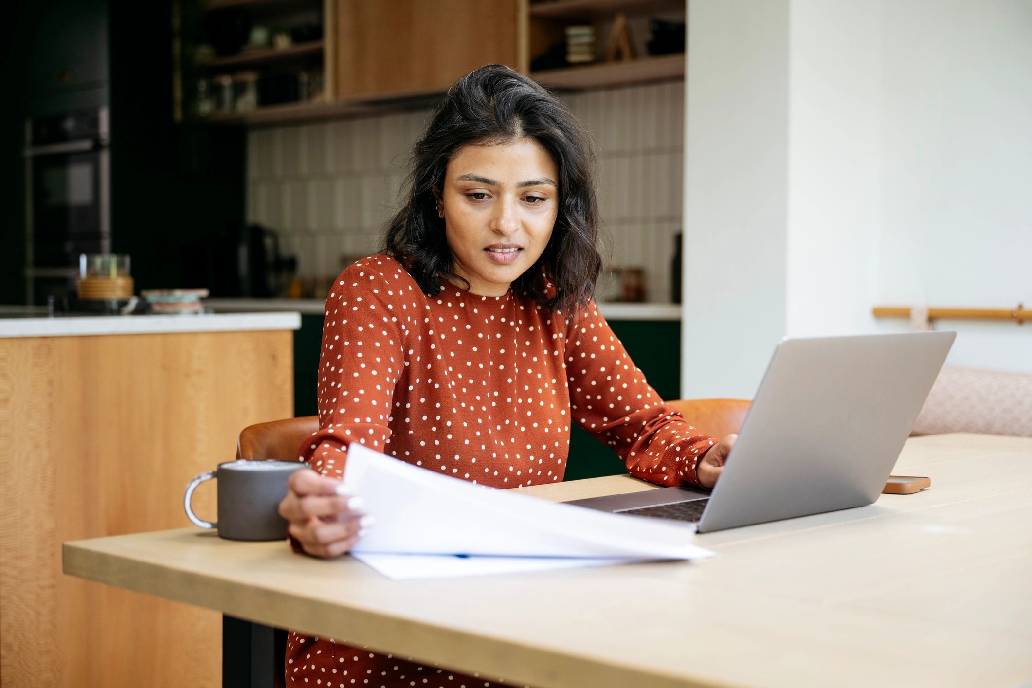 The Mortgage MD homebuyer financial planning on a laptop at home